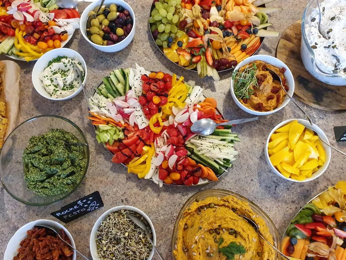 Colourful fruit, vegetables and vegan dishes at a previous retreat
